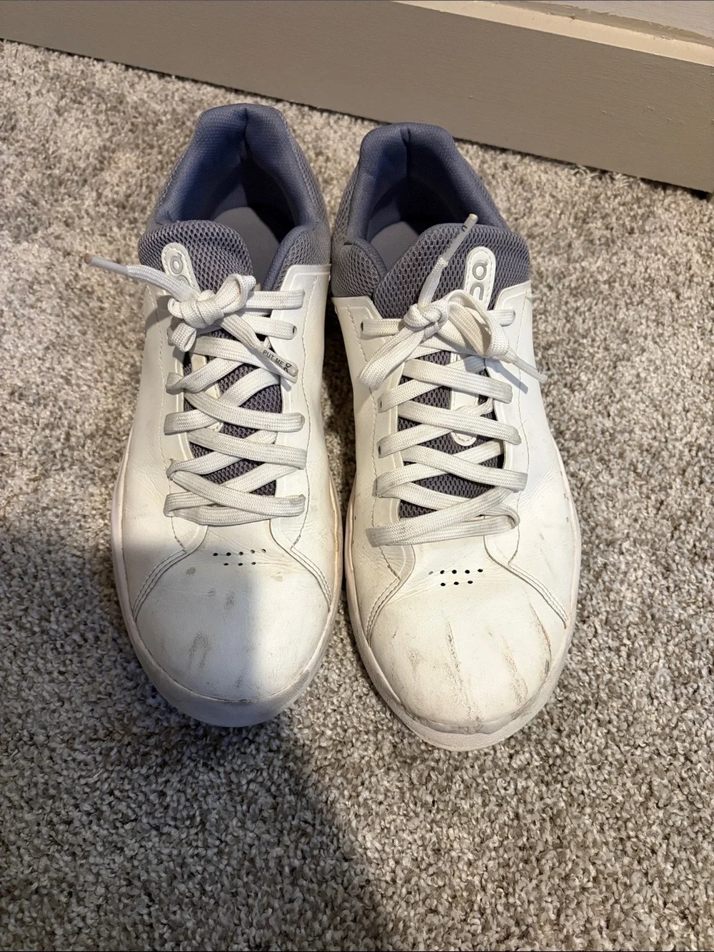 On Running “Roger” Sneaker. White and grey. Mens size 10.5. Used.
